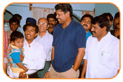 Mr. N Bitra & Bill Bitra, Sri PNV Prasad, Ex.SAAP Chairman With Mr. Kapil Dev. The occasion of Kinetic Boss Vehicle Opening at Bitra's House At Banjara Hills, Road No. 10, On 21st Oct'2002.